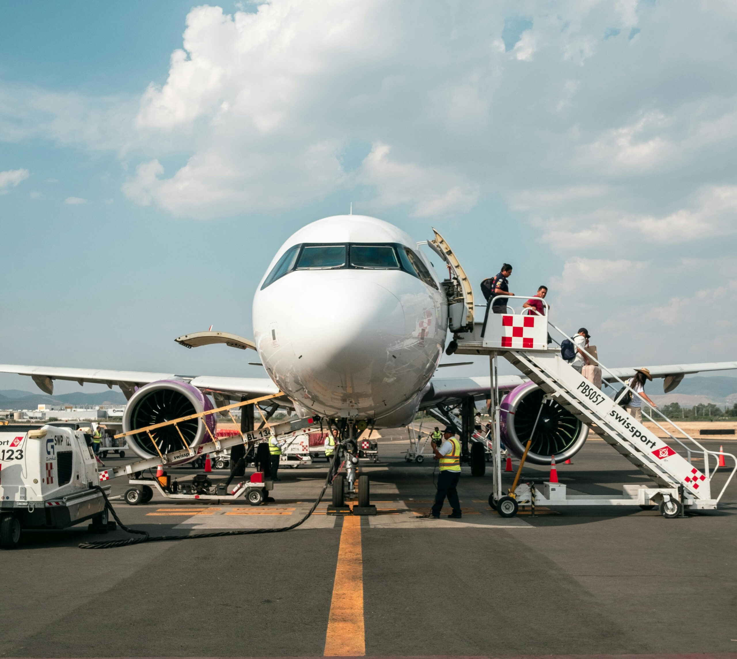 airplane boarding scene representing aviation therapy support