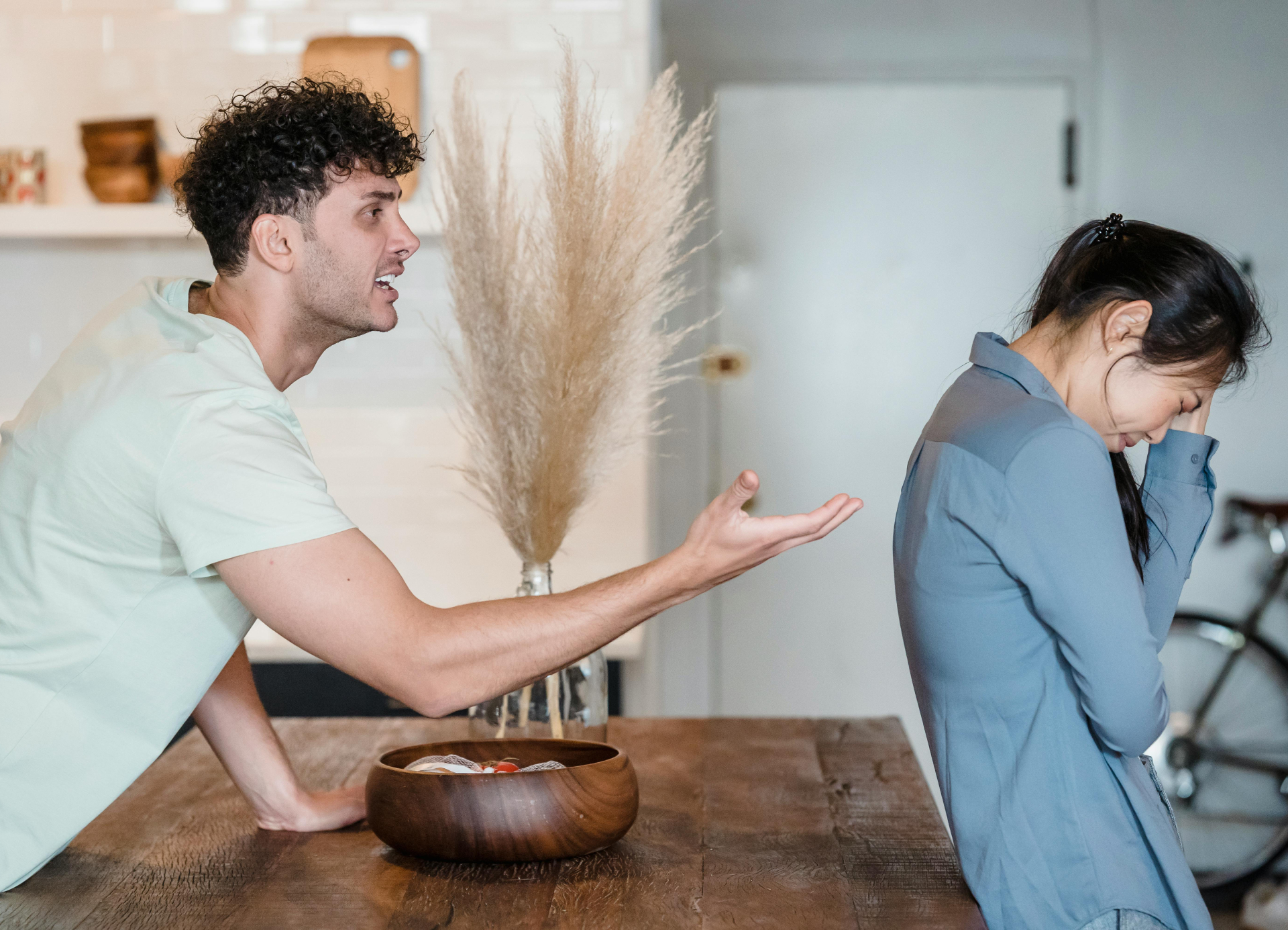 Couple experiencing relationship conflict during an argument, representing the need for anger management counselling.